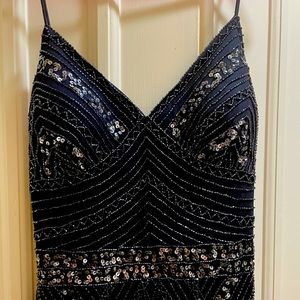 Full length beaded gown.